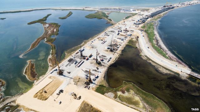 Construction on a bridge intended to link Russia with the Crimean Peninsula