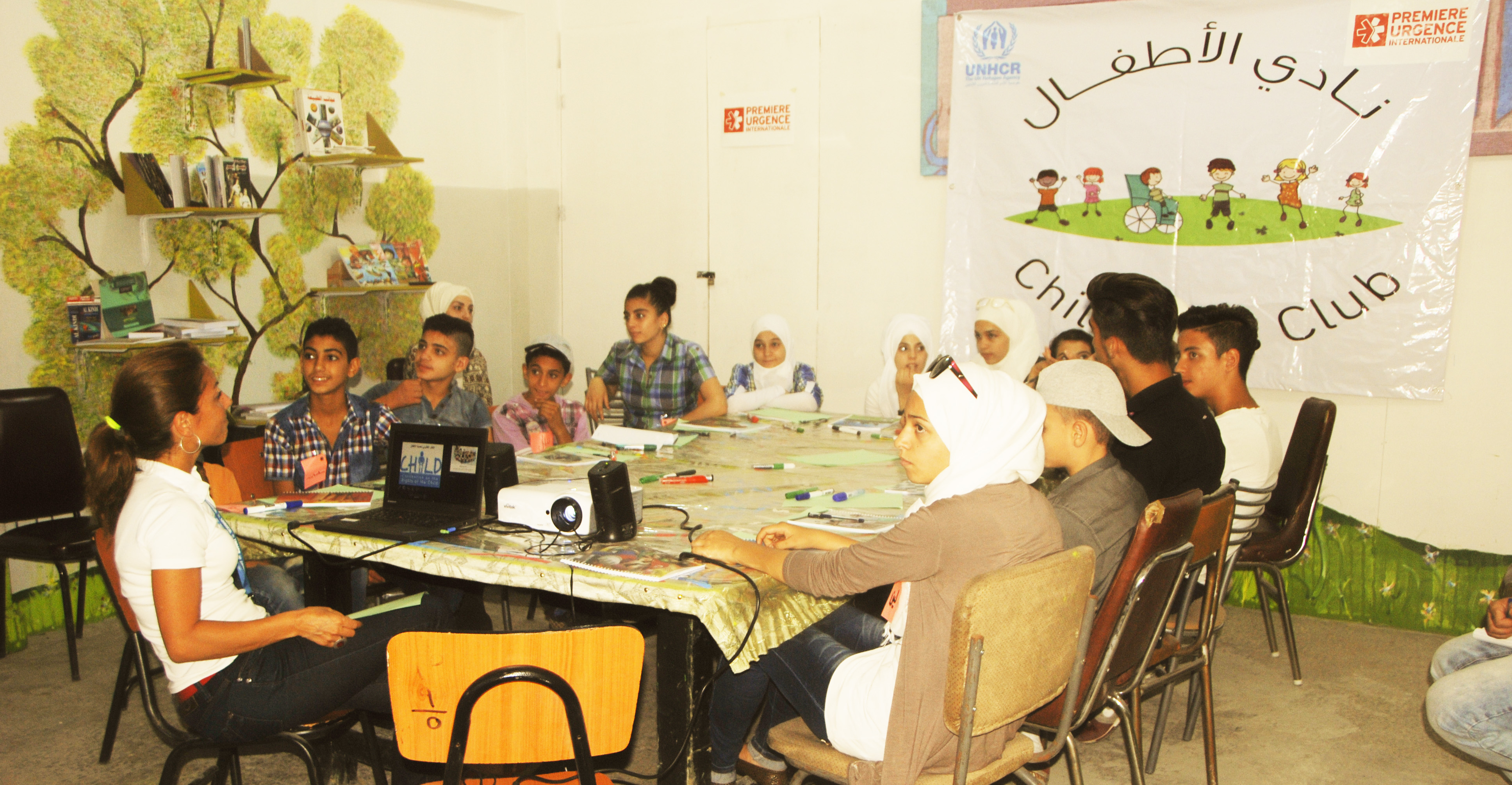 All children and youth live with some risk of experiencing violence; their age, size, inexperience and dependence which all make them vulnerable. They are at particular risk of violence during conflict and emergencies as the current situation in Syria. ; The purpose of the Children’s Club is to relay the challenges and obstacles that children face in their community or inside the school to UNHCR's team as well as submit ideas that can improve their surrounding environment. Nisreen will be the voice of her colleagues. The UNHCR team in return will try to help by implementing these ideas and make them realities.