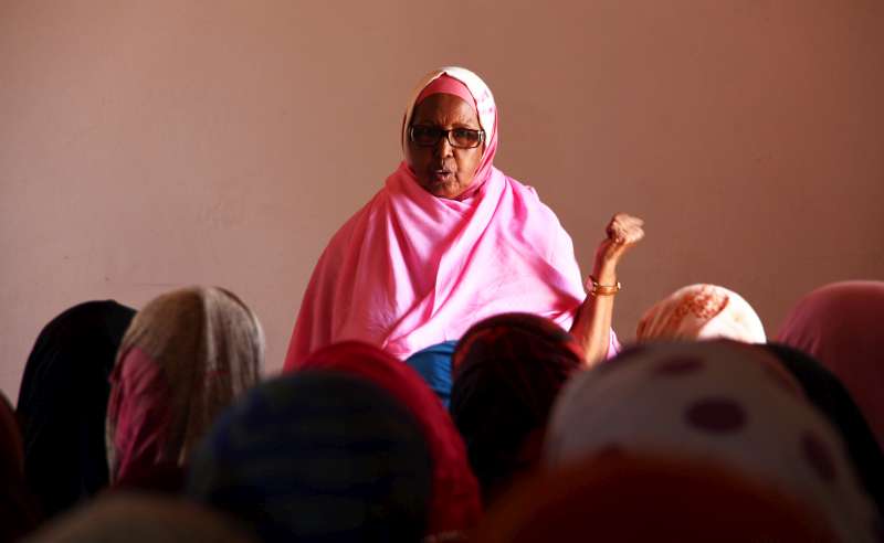 Mama Hawa speaks to a group of internally displaced women at the Halabokhad settlement in Galkayo, Somalia. She believes that "illiteracy in women is the reason why they can't demand their rights." 