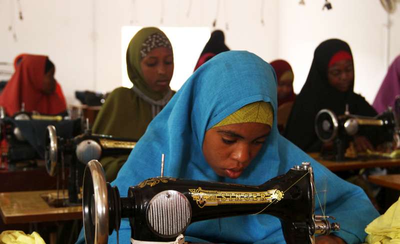 Young IDP girls learn new tailoring skills in Galkayo, Somalia. This training provides an income for the girls. "Seeing these girls earning a living, it is a good feeling," 