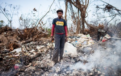 Dominican Republic. Joe Hullman, 13, works at San Pedro de Macoris municipal dump during his summer vacations looking for metal scraps in San Pedro de Macoris, in Dominican Republic. I like going to school  I especially like math. When I grow up I want to be a baseball player. But I dont play baseball this summer  I am on vacation.