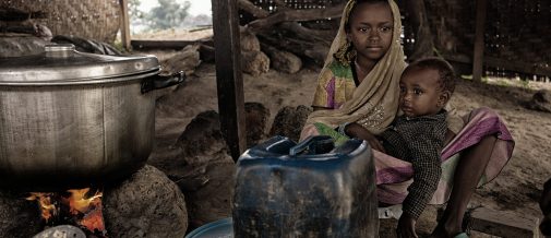 Cameroon/CAR refugees / Portrait of two unaccompanied children, brother and sister, taken on november 05, 2014, inside Adama's kitchen. Adama is a CAR refugee, cook of the Gado's refugees site and host family for orphans and unaccompagnied children. /UNHCR/O.Laban-Mattei/November 2014