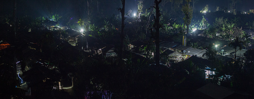 Refugee camp in Nepal lit by street lights. UNHCR designed a pilot for a mini-grid system to power street lights in the camp.