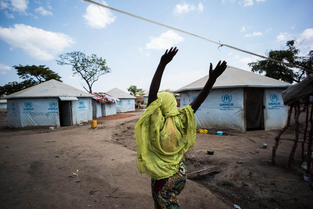 Sadia, 14, walks through the refugee site in Gado, Cameroon – feeling free after being rejected by her much older husband. UNHCR / Olivier Laban-Mattei