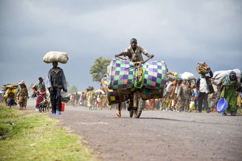 Thousands of people flee the IDP site at Kibati, in Democratic Republic of the Congo’s North Kivu province, after hearing gunfire. 