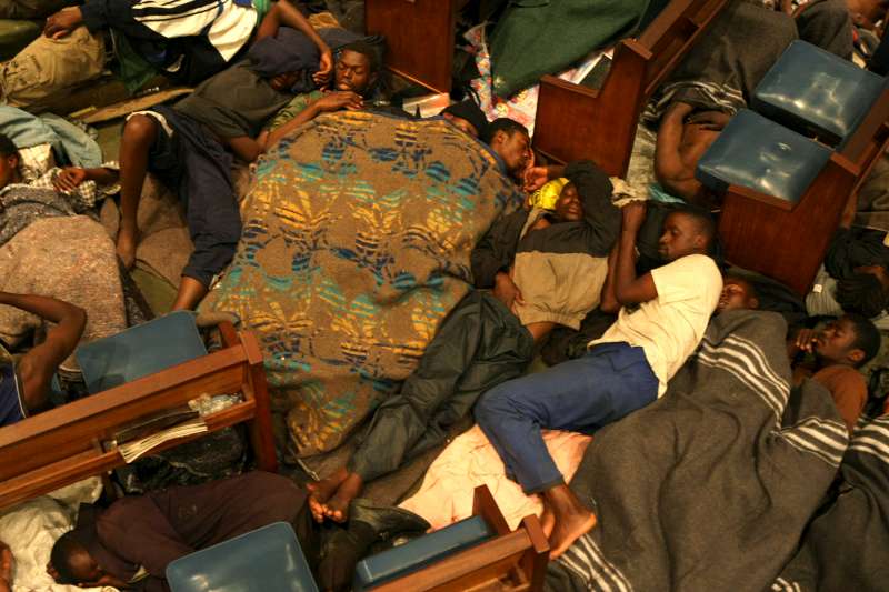 Every evening, the Central Methodist Church in Johannesburg, South Africa, provides shelter to almost 4,000 Zimbabwean refugees. People sleep wherever they can find space. 