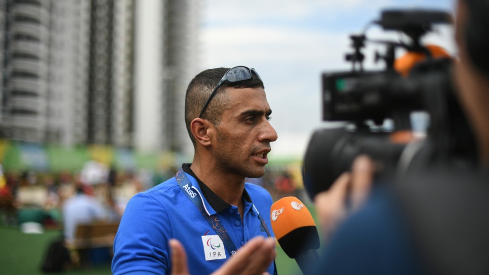 Independent Paralympic Team swimmer Ibrahim Al-Hussein meets reporters at the Paralympic Village in Rio de Janeiro, Brazil. 