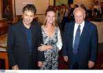 George Dalaras (left) with the UNHCR Representative in Greece, Karen Farkas, and Greece's President Karolos Papoulias after the singer was proclaimed a UNHCR Goodwill Ambassador.