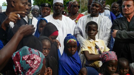 Bono, the lead singer of U2 and cofounder of international campaigning and advocacy group The ONE Campaign, visits displaced families at a settlement in Maiduguri, Nigeria.  © Roopa Gogineni @ ONE