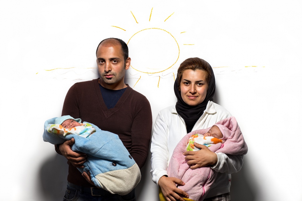 Pariz, 25, and Samir, 23, from Afghanistan with their two-month-old twins, Maholiyar and Maholis.<br><br>The children were born on the road -- a situation which is not uncommon. Volunteer doctors even delivered another baby in Keleti Station a few days before they arrived.