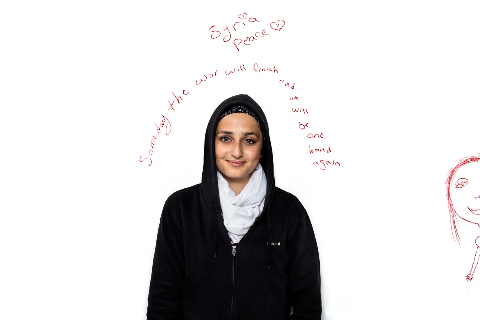 Rawaa, 18, from Syria.<br><br>Rawaa left her home in Aleppo, which has suffered some of the worst destruction during the war. Her message: "Someday the war will finish and we will be one land again."