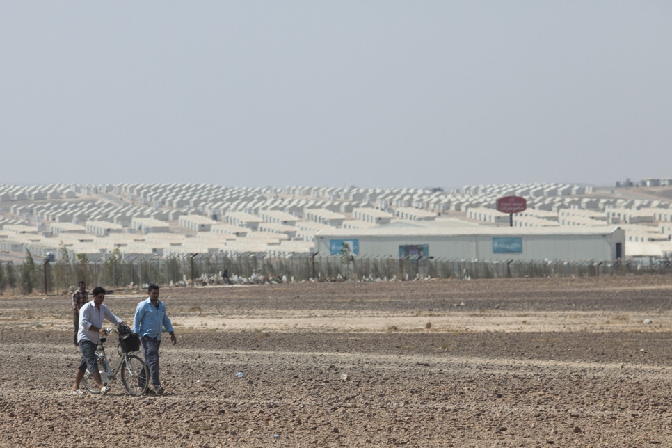 "Azraq is the second biggest camp for Syrian refugees here in Jordan. It is like nothing you've ever seen. The terrain is a light brown and together with the uniform buildings it resembles something out of a sci-fi movie. It seems so anonymous and impersonal but once you get up close there are people everywhere. There are community centers - places to read books, places for kids to play soccer, and areas for adults to learn new skills. You might see classes for tailoring or hairdressing - people want practical skills they can use to earn a small wage. 
People are living in an environment that is a far cry from their lives back home in Syria, yet once you step into this lunarscape everyone is so friendly, welcoming, optimistic, open and caring." 