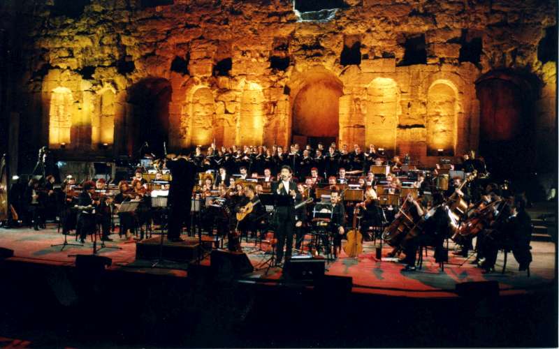 UNHCR Goodwill Ambassador George Dalaras performs with the 90-member Kamerata Orchestra and a choir during a concert in Athens to mark UNHCR's 50th Anniversary.