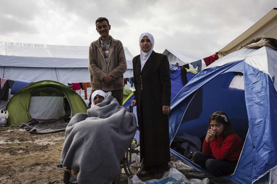 "Waiting has been the most difficult part, more difficult than the boat."

Esmail Shreki worries about his elderly mother, Fatima, who sits in a wheelchair beneath a mound of blankets. Its wheels are caked in mud. The previous night's rains left puddles around the tent where they have been sleeping for the past 10 days as they wait to cross the border into the Former Yugoslav Republic of Macedonia.

Esmail, who was a mechanical engineer in Syria's Idlib province, fled to Europe with his mother, his wife and four children after an air strike hit their home. Esmail carried his mother on his back at several points along the way. Now the family wait their turn to cross, with little information on when they will be allowed to move forward.