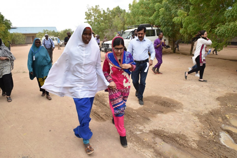 Fatuma welcoming Malala in Nasib Secondary School in Ifo 2. photo UNHCR/C.Opile