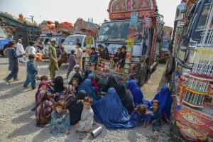 Afghan refugee families awaiting for their turn for the process to be completed at the UNHCR repatriation centre in Peshawar, so that they can start the long journey home to Afghanistan. The refugee families have been in Pakistan for thirty seven years and all their children have never set foot on Afghan soil. " (c) UNHCR/S.Rich