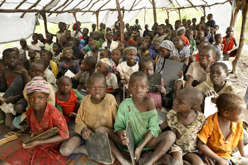 Children from the Central African Republic, who were displaced by an attack on their village, attend class at a bush school near the Chadian border. 