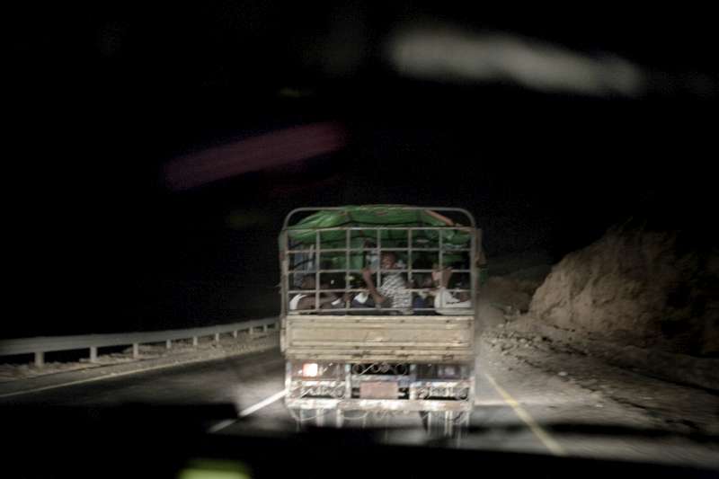 A UNHCR truck transports new arrivals from Hosaisha to a reception centre where they will be registered and given food, water and medicine.