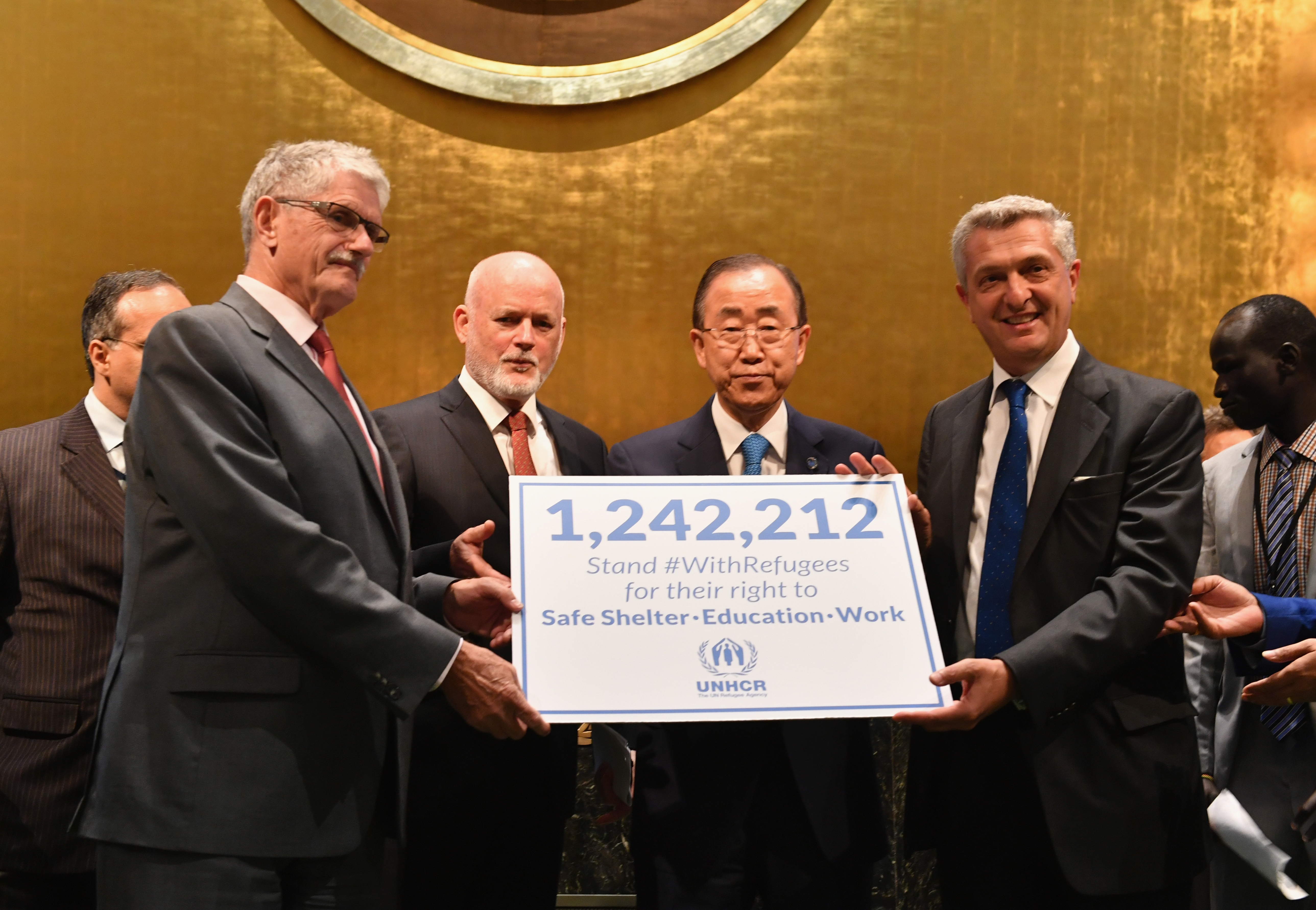 (L-R) President of the General Assembly #70 Mogens Lykketoft, President of the General Assembly #71 Peter Thomson, UN Secretary General Ban Ki Moon, and UNHCR High Commissioner Filippo Grandi attend UNHCR #WithRefugees petition handover at UN General Assembly Hall at United Nations on September 16, 2016 in New York City. ; UN Secretary-General Ban Ki-moon today received a petition – #WithRefugees – from UNHCR, the UN Refugee Agency, signed by more than 1.2 million people expressing solidarity with millions of people across the world driven from their homes by conflict and persecution.
Taking receipt of the appeal at the UN General Assembly in New York, together with Assembly President Peter Thomson, Ban noted the global scope of support for refugees.
The petition calls on representatives of the 193 governments attending the Summit to make sure all refugee children can go to school; that all refugees have a safe place to live and that all refugees can work and contribute to their local community.