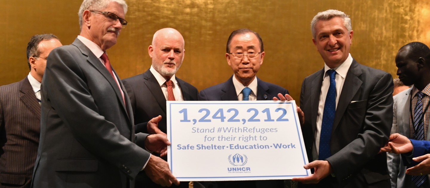 (L-R) President of the General Assembly #70 Mogens Lykketoft, President of the General Assembly #71 Peter Thomson, UN Secretary General Ban Ki Moon, and UNHCR High Commissioner Filippo Grandi attend UNHCR #WithRefugees petition handover at UN General Assembly Hall at United Nations on September 16, 2016 in New York City. ; UN Secretary-General Ban Ki-moon today received a petition – #WithRefugees – from UNHCR, the UN Refugee Agency, signed by more than 1.2 million people expressing solidarity with millions of people across the world driven from their homes by conflict and persecution.
Taking receipt of the appeal at the UN General Assembly in New York, together with Assembly President Peter Thomson, Ban noted the global scope of support for refugees.
The petition calls on representatives of the 193 governments attending the Summit to make sure all refugee children can go to school; that all refugees have a safe place to live and that all refugees can work and contribute to their local community.