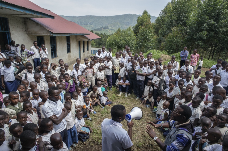 Young actors working with Search For Common Ground, a UNHCR partner, put on a theatrical presentation at a school in Masisi, Democratic Republic of the Congo.