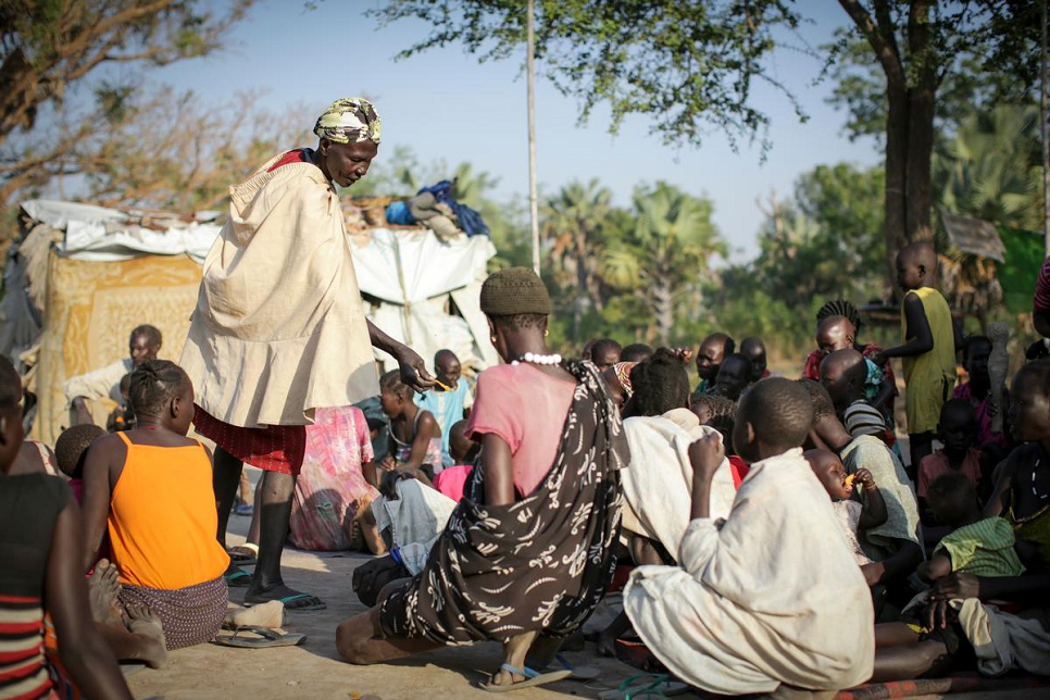 Humanitarian organizations provide food, pots, pans, mosquito nets, and sheeting for shelter, but in the initial days after reaching safety, it is locals who give the first help.