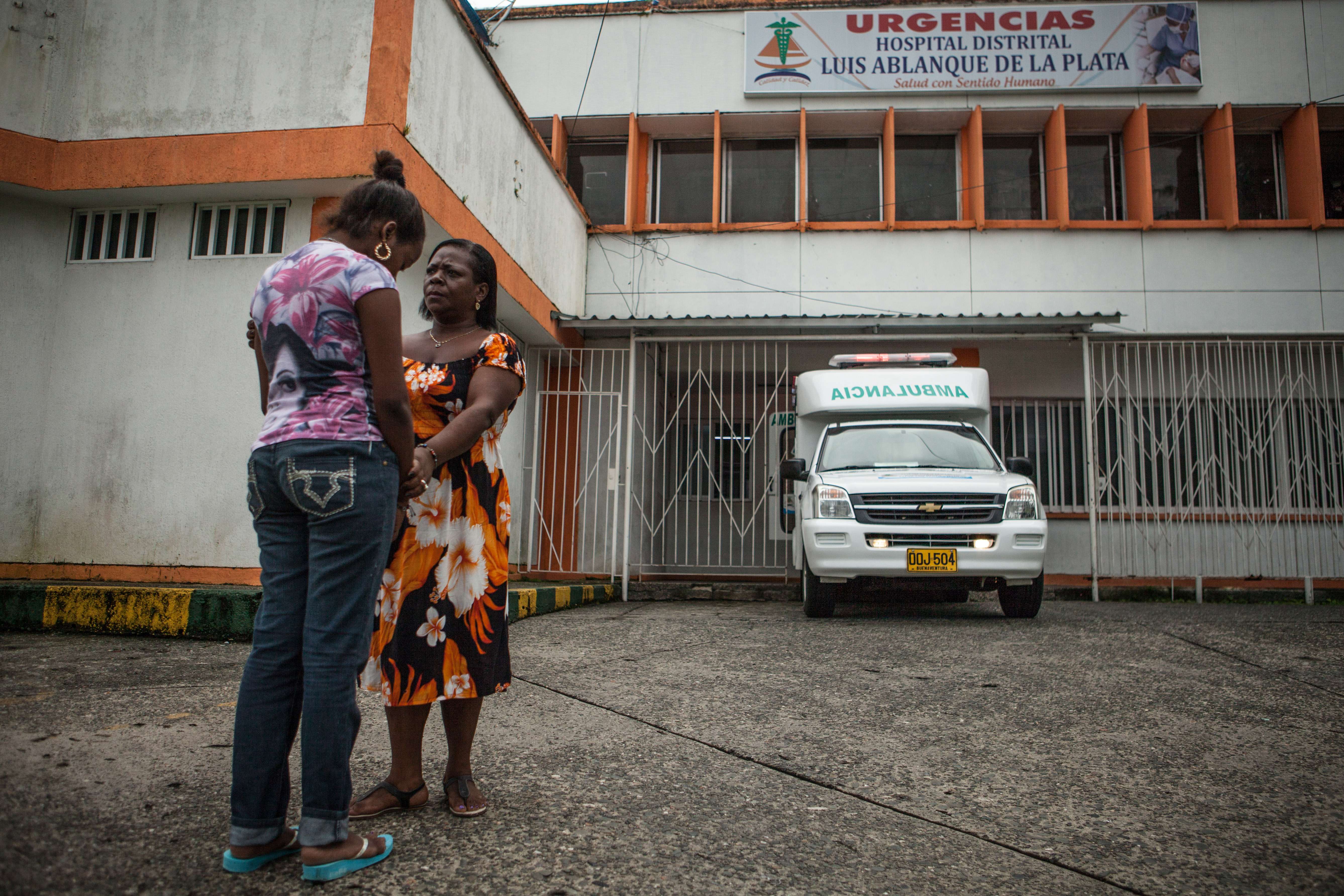 August 18, 2014. Mery Medina with Yadira Rodriguez Caicedo (16), assisting her about her health and assistant programs available to her at the hospital “Luis Ablanque de la Plata’ in the Neighborhood of Lleras in Buenaventura, Colombia.

Mery Medina (50); at high risk of displacement-Single mother to her son-Coordinates a group of 30 women whose husbands/sons have been assassinated or have disappeared-Helps to improve their financial position by offering cooking & sewing workshops-Helps SGBV survivors to speak and express their emotions-Didn’t have money to study, but her dream was always to become a social worker.

Butterflies of New Wings is a network comprised of about 120 core volunteers. Each woman is tasked with recruiting five new women so that their reach will become wider. The group is described as a “ protection network of women helping women within the armed conflict.” Part of their strategy is to stay below the radar of the armed groups - of which there are many- in Buenaventura. 

Paramilitary groups have controlled Buenaventura, Valle del Cauca department, since 2006. The Urabeños and the Empresa are the main groups operating in the port city. However, since 2009 Cauca has had the largest number of armed actions in Colombia. They restrict residents’ movement – attacking people if they step foot into the wrong street (crossing the invisible yet strict borders).

Photo Credit: Juan Arredondo for UNHCR.