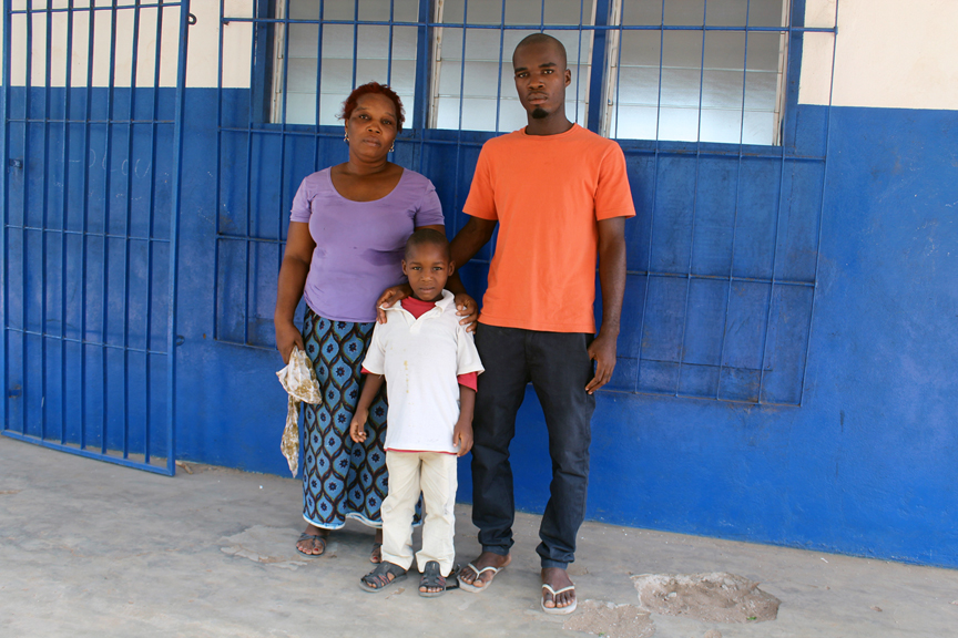 An Ivorian refugee widow, forty-year-old Cyriane poses with her two sons Boris, 5 and Bendel, 24, in Avepozo refugee camp in Lomé, Togo. They have just been accepted to the resettlement programme in the United States. Cyriane lost her husband during the post election crisis in Côte d’Ivoire in 2011 and fled her country with her children to escape further violence. She welcomes the opportunity to start a new life in the US with her sons.  UNHCR / Simplice Kpandji 