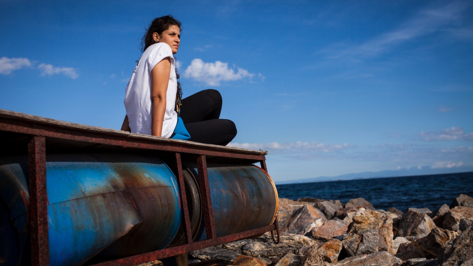 Sarah Mardini looks out to sea in Lesvos. 