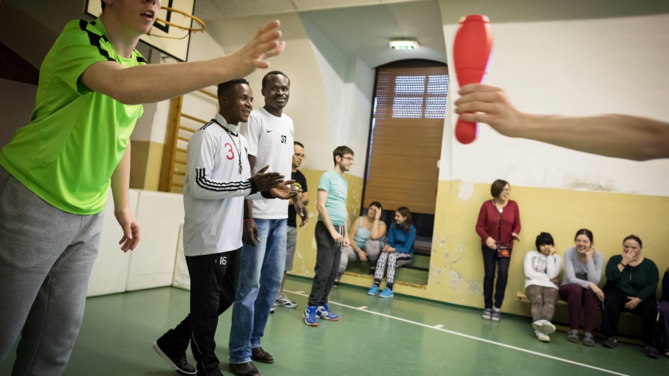 Kingsley Okonweze, 25, and Amen Goody Saint Paul, 23, from Nigeria teach sports to handicapped people in a Caritas-run home for the disabled in the village of Wimpassing an der Leitha.