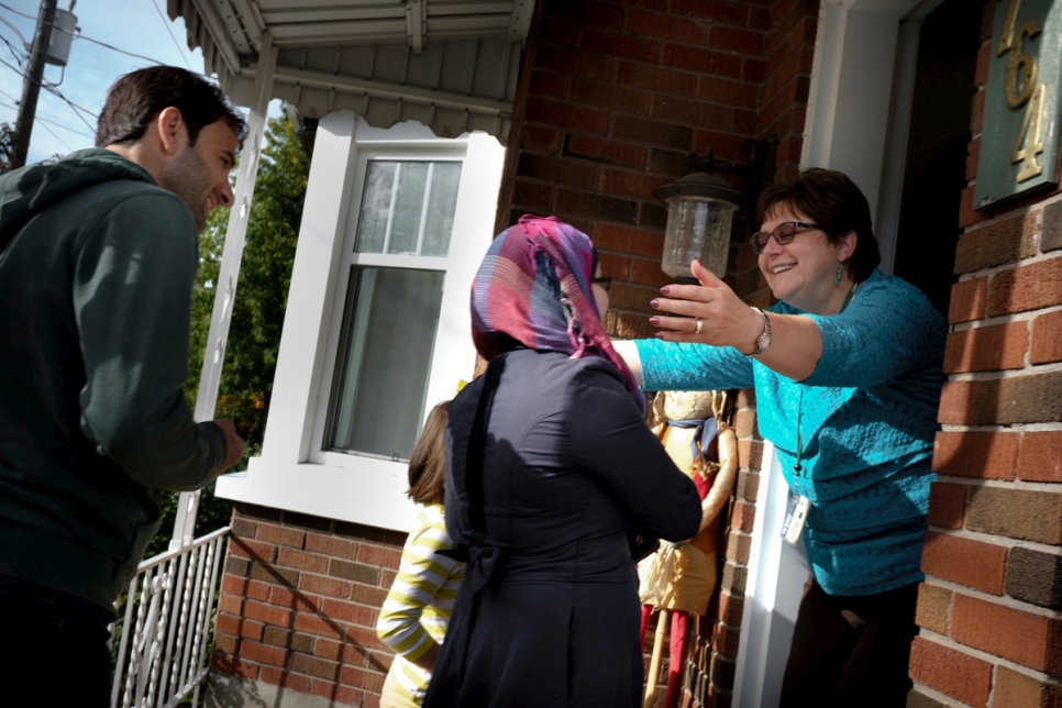 Tanna Edwards welcomes the Eshadi family into her home.