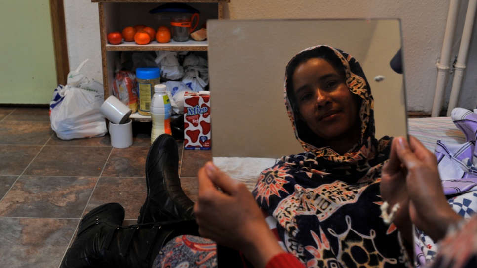 Sudanese refugee Seherezade in her room at the John Wesley homeless shelter, which helps refugees who have nowhere to live.