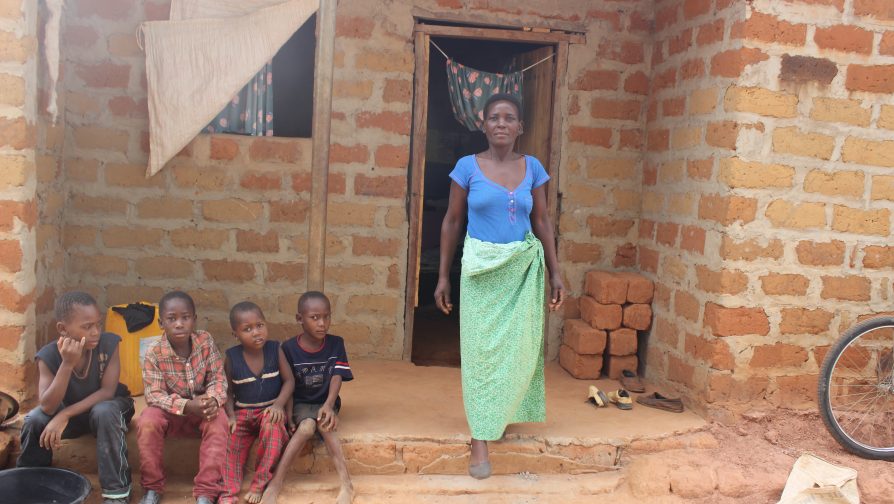 Ireen Mweemba, outside her newly built home in the Meheba resettlement scheme which brings former refugees and Zambians to live together as part of the UNHCR supported local integration programme.