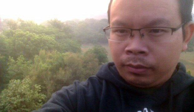 Journalist Li Xin, who went into exile to protect his family in China, in an undated photo.