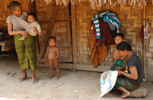 Women and children in a Khmu ethnic village in northern Luang Namtha province in Laos, March 10, 2011.
