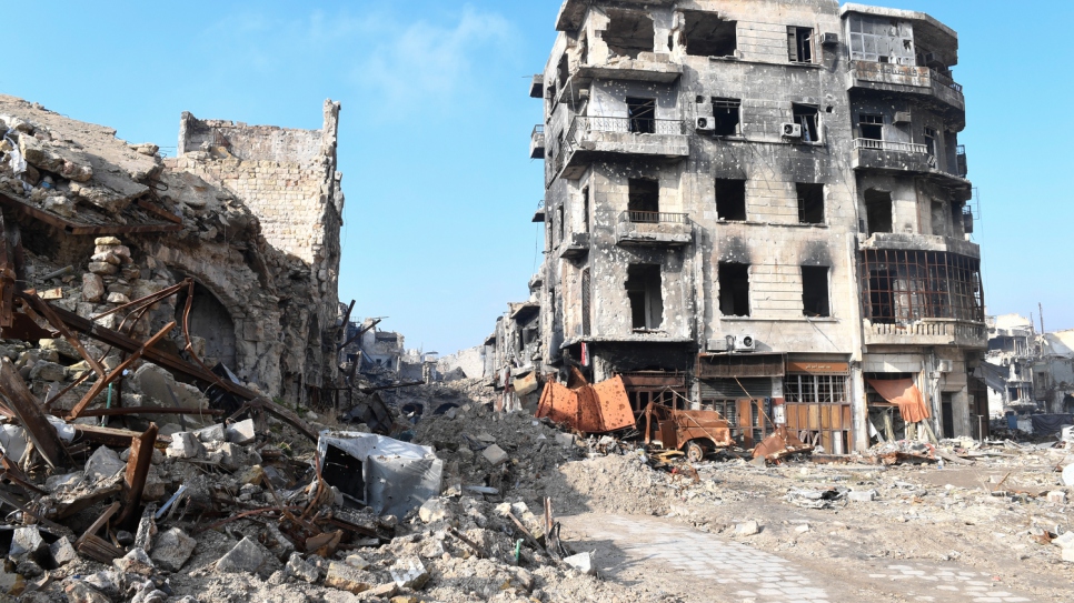 Rubble and bombed out buildings show the scale of destruction in east Aleppo.