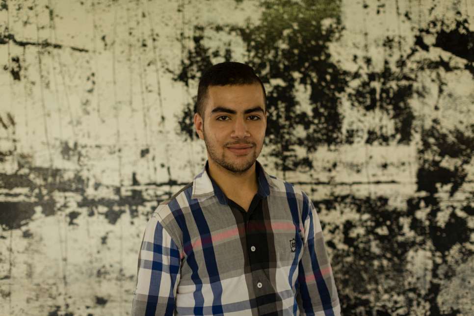 Moustafa, 16, poses for a portrait at the Tatuape Subway station in Sao Paulo.