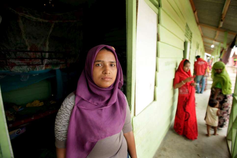 Fatima and her two sons left Myanmar to join her husband in Malaysia. Instead they landed in Aceh, Indonesia, after being rescued from their sinking smugglers' boat.