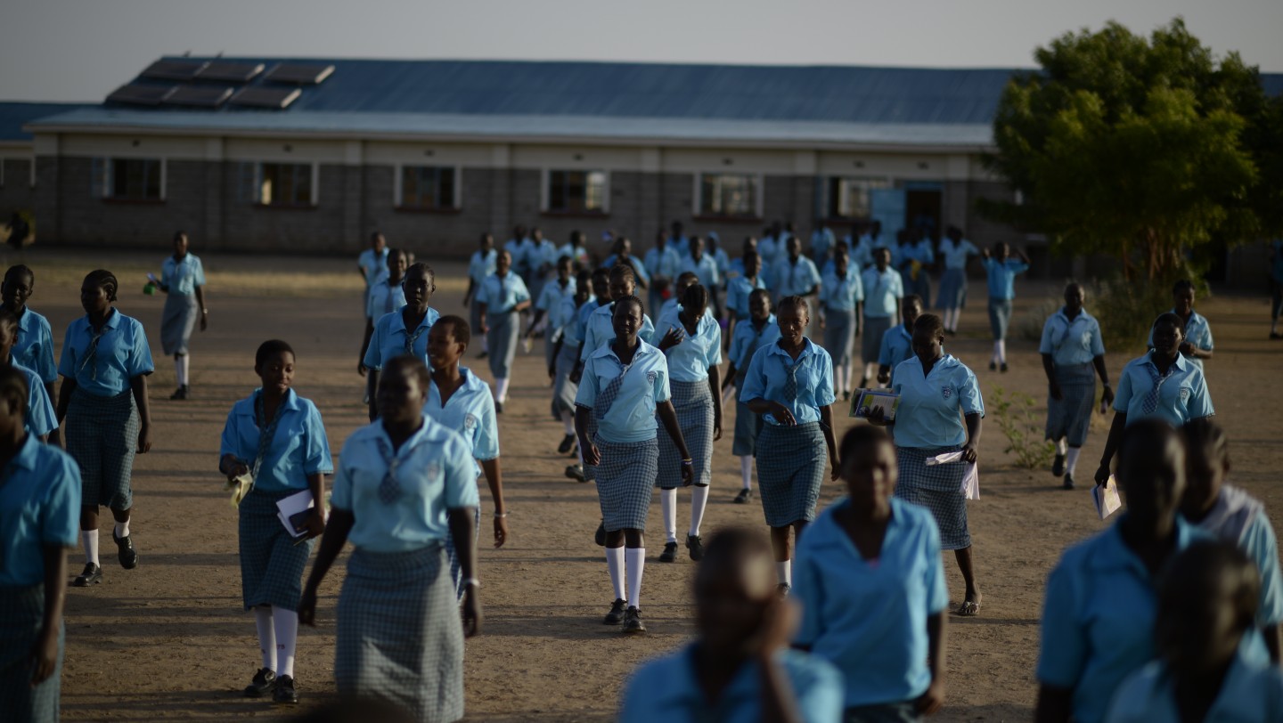 Students going to lunch break at Morneau Shepell Secondary School for girls in Kakuma Refugee Camp, Kenya ; Esther is the last born in a family of three girls, raised by a single mother. Born in Juba, she has no recollection of her father who died in the war before she was born. I barely remember him. All I have is pictures and stories that people tell. She smiles wistfully as she recalls her halcyon days growing up in Juba. I did not understand the war or why people were fighting. My mother shielded us from the reality but as we grew older, we started to see its effects.

Her mother brought the girls to Kakuma camp in 2009 when the tensions in Juba escalated to fever pitch levels and insecurity was rife. Although she was only 10, Esther vividly recalls the arduous journey to the camp. It took us almost one week to travel. We left Juba at night with nothing but the clothes we were wearing. Their journey took them through Uganda first and then Kenyas capital before eventually arriving in Kakuma. At one point our bus broke down in the bush and we were almost attacked. We hid under the seats until help arrived and the attackers ran off. Her uncle Chol received them at the camp and offered them shelter. He also guided them to the UNHCR office where they would get ration cards to enable them access various services in the camp.