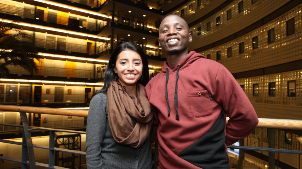 Laura Elizabeth Valencia Restreppo, a Colombian refugee living in Ecuador, and Joseph Munyambanza, a refugee from the Democratic Republic of Congo living in Uganda, at UNHCR headquarters.