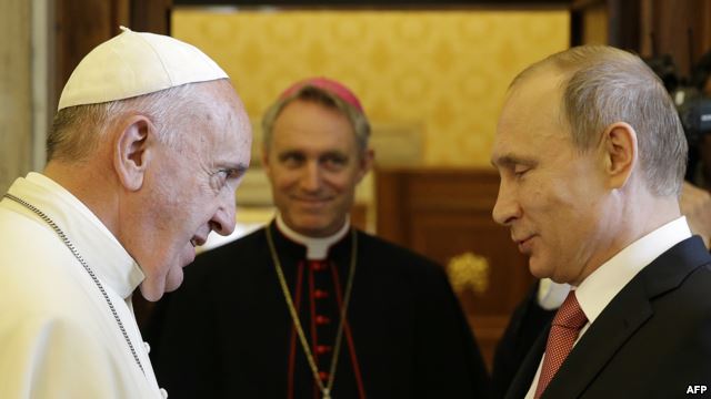 Pope Francis (left) meets with Russian President Vladimir Putin on the occasion of a private audience at the Vatican on June 10.