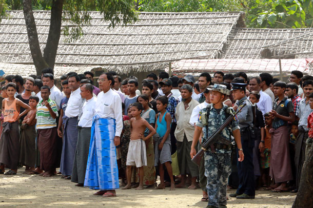 Rohingya Muslims gather for the arrival of a United Nations envoy and foreign diplomats in Ale Than Kyaw village, Maungdaw township, western Myanmar's Rakhine state, Nov. 3, 2016.