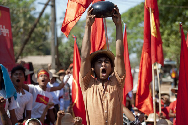 Myanmar students shout slogans during a protest march in Letpadan, Myanmar, March 4, 2015.