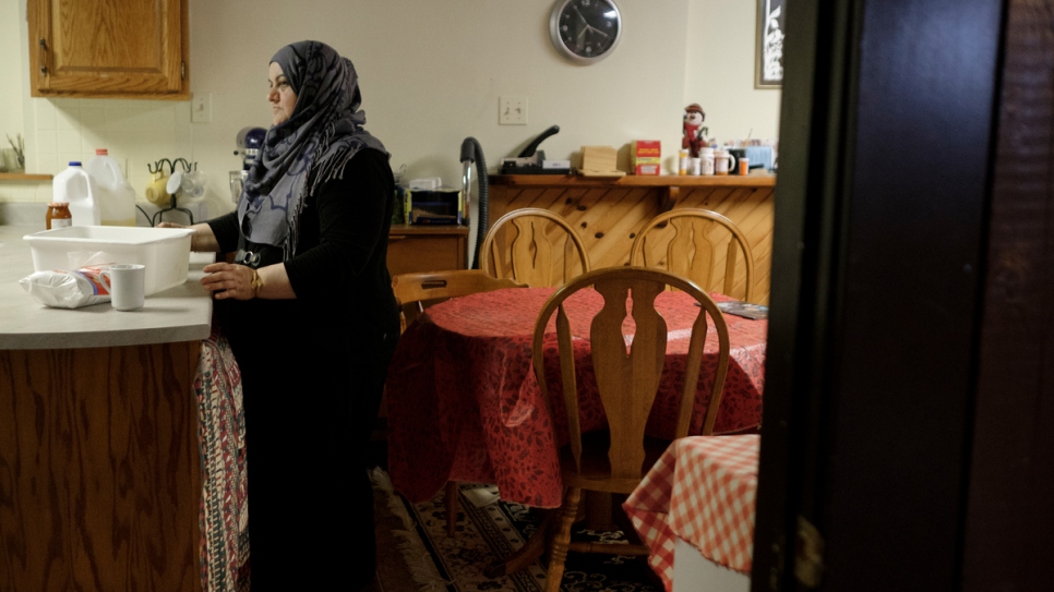 Rabiaa prepares pastries to sell at a weekend farmer's market.