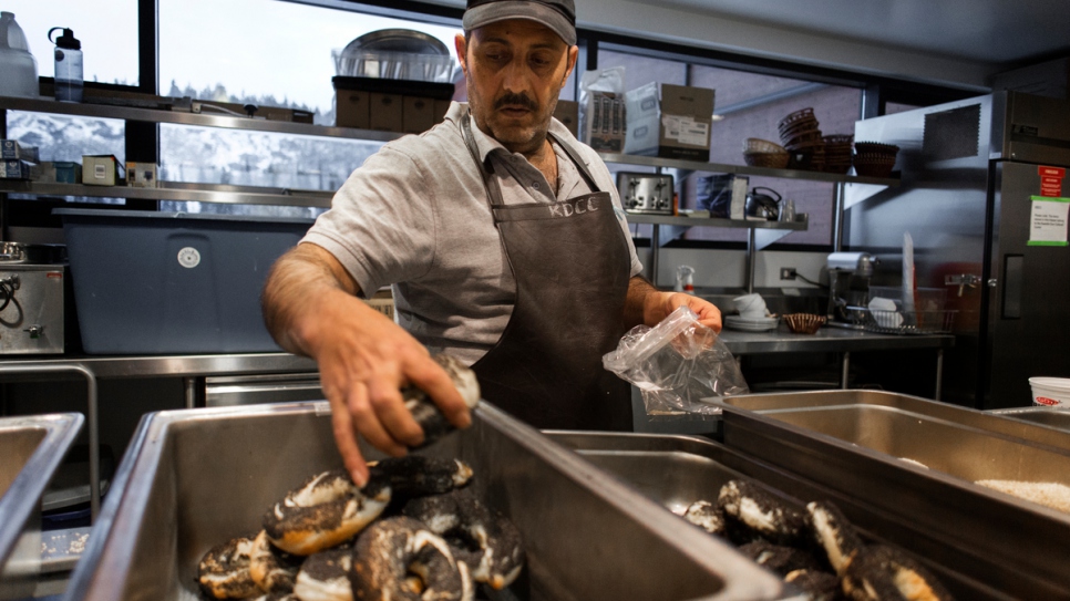 Hussein Arafat works early mornings for a local bagel company in Whitehorse.