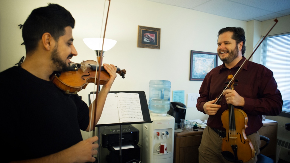 Sari practices with his mentor, Michael, at the Victoria Conservatory of Music.