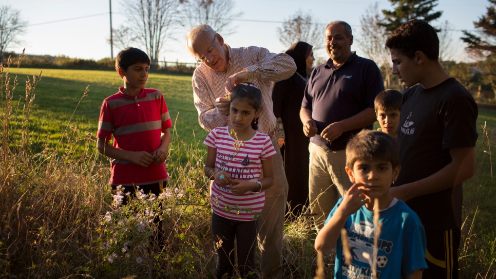 David Friendly chats with the Ayash family in Lunenburg.