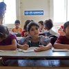 Refugiados sirios en una clase de aprendizaje acelerado en una escuela pública en Lamed Al Louz, en el valle de Bekaa (Líbano). © ACNUR/ S.Baldwin