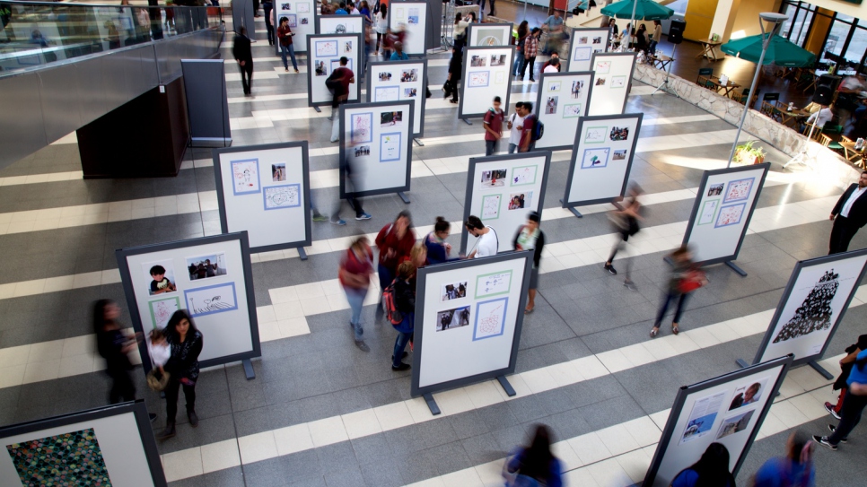 The opening of RefugiArte, an exhibition in the bus station in San Luis, which aims to raise awareness of the plight of refugees around the world.