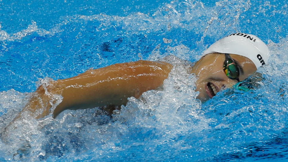 Yusra Mardini, an 18-year-old swimmer who fled the war in Syria, powers through the water in her last race of the 2016 Games.